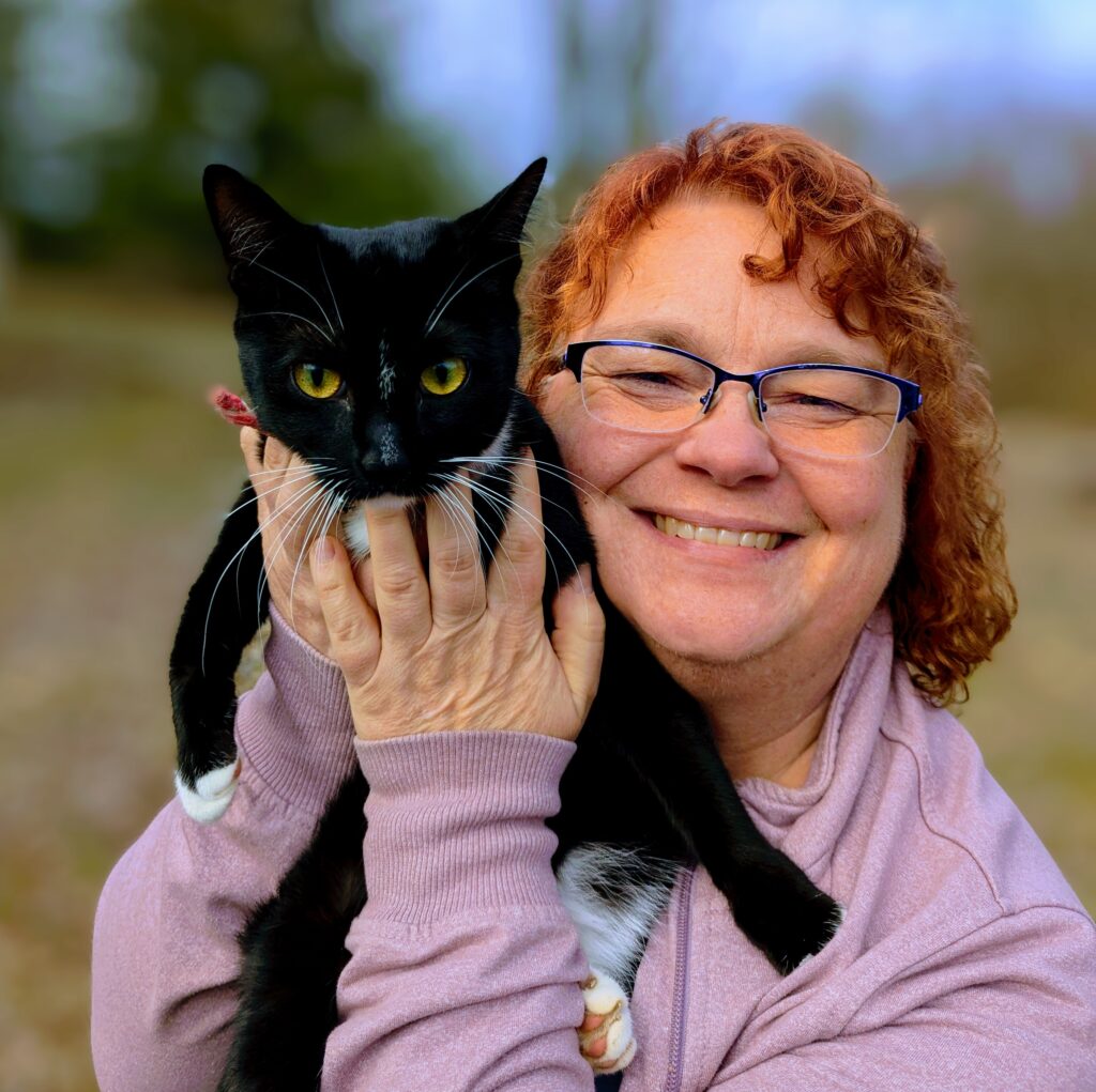 BrendaWithSmidgen Dr Brenda Specht with her tuxedo kitten, Smidgen.